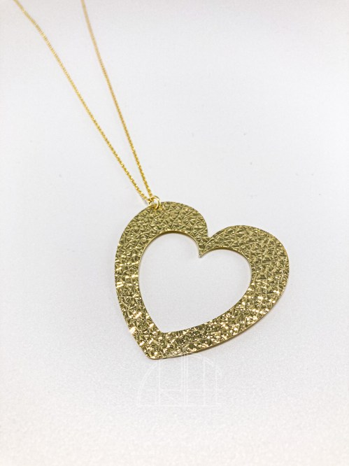 Collana lunga in argento con ciondolo cuore oro